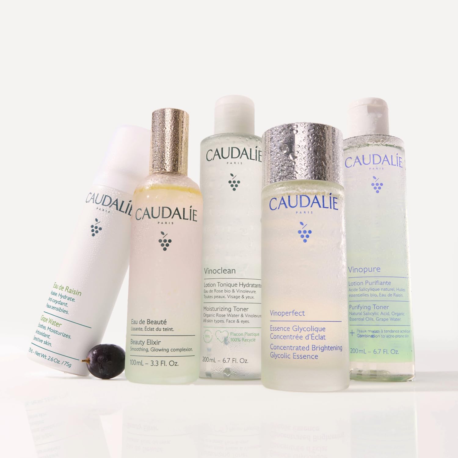 Caudalie Vinoclean next to hand for scale showing compact 100 mL travel-friendly size