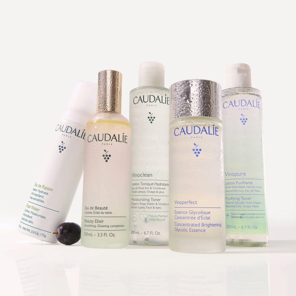 Caudalie Vinoclean next to hand for scale showing compact 100 mL travel-friendly size
