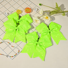 CEELGON side view showing elastic hair tie attachment that delivers secure hold during routines
