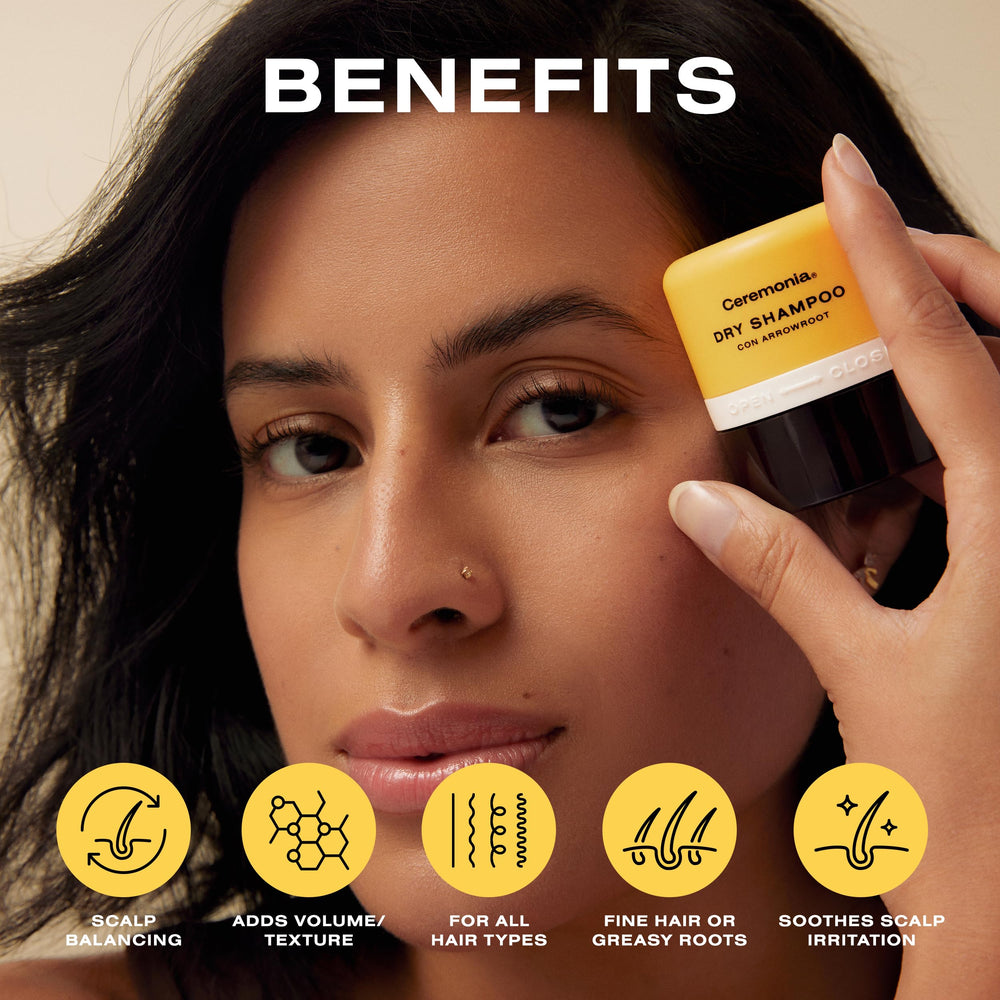 Ceremonia applying powder to dark hair roots to reduce shine and add volume