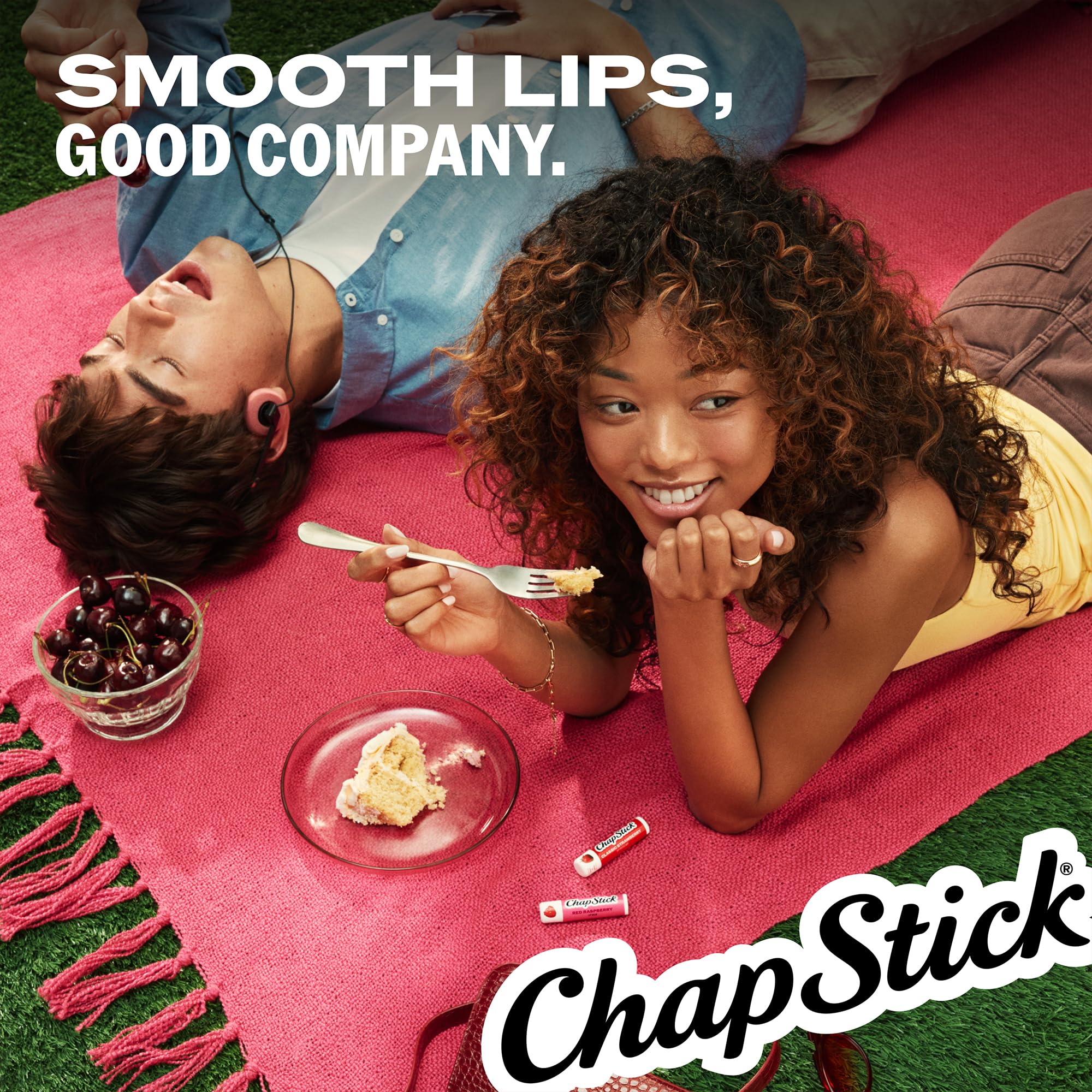 ChapStick brand tube on desk beside notebook highlighting everyday readiness