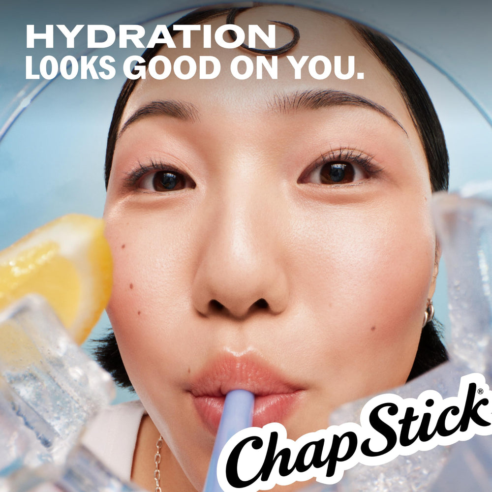 ChapStick cotton candy applied outdoors showcasing hydration and wind protection benefit