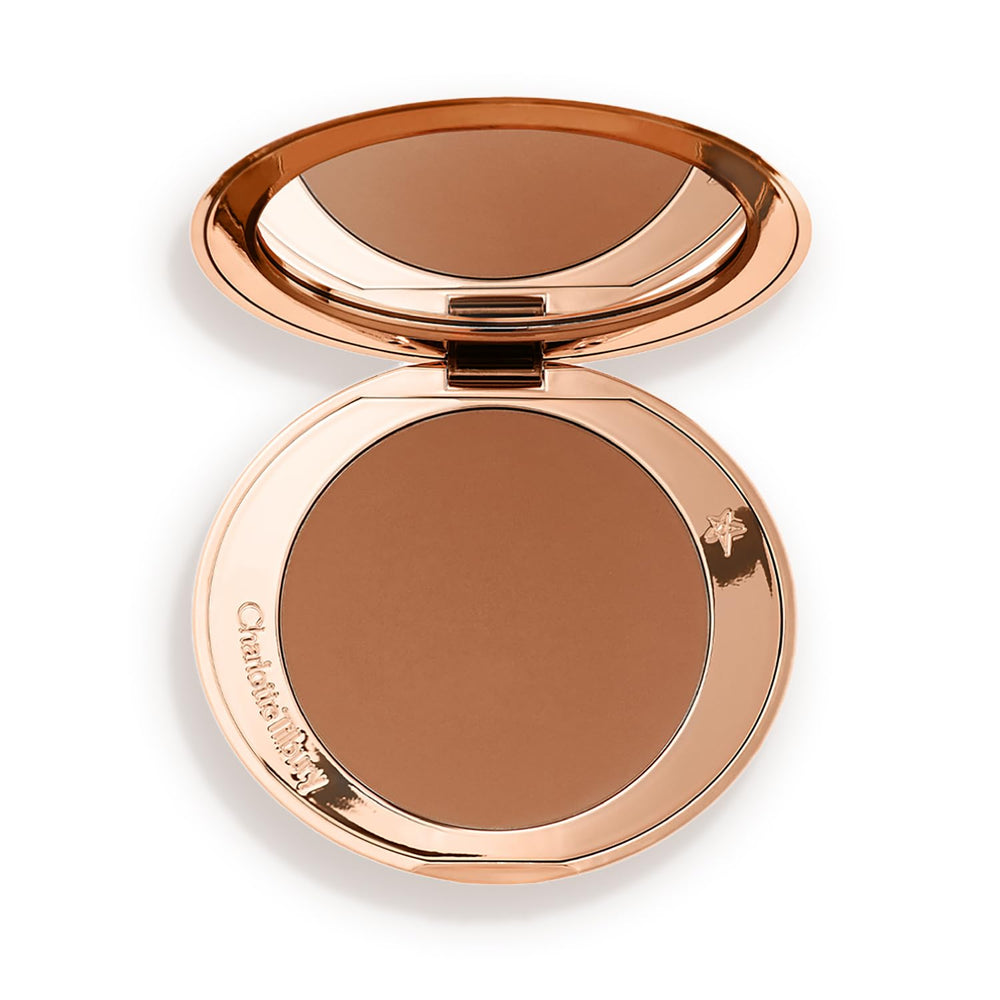 Charlotte Tilbury compact front view showing sleek refillable design and benefit of portability