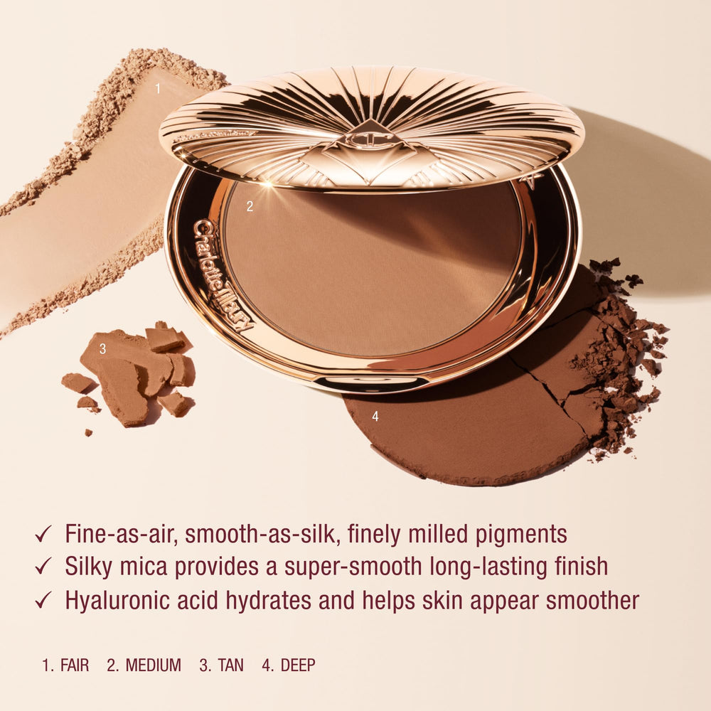 Charlotte Tilbury bronzer swatch on arm showing true Fair shade payoff