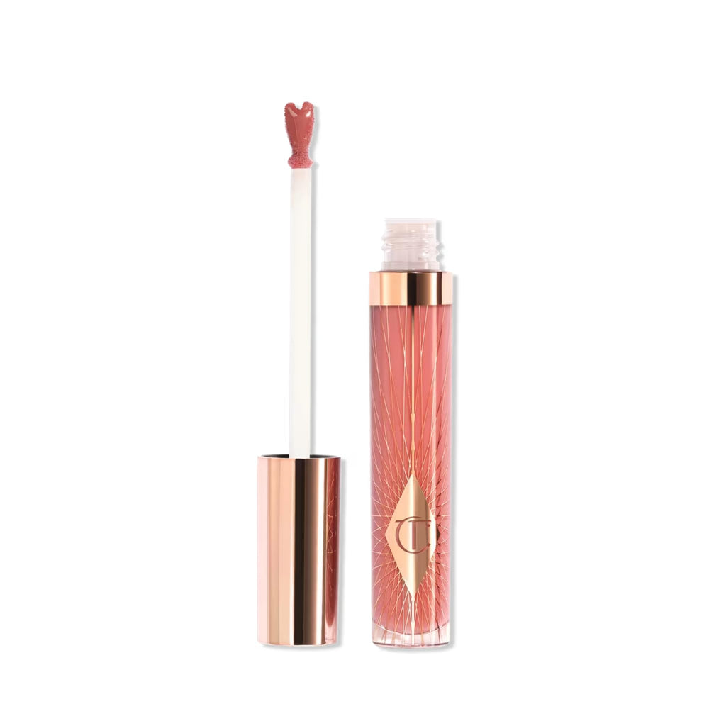Charlotte Tilbury tube front view showing glossy pink finish and brand