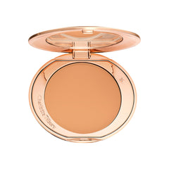 Charlotte Tilbury compact front view showing sleek design and easy portability