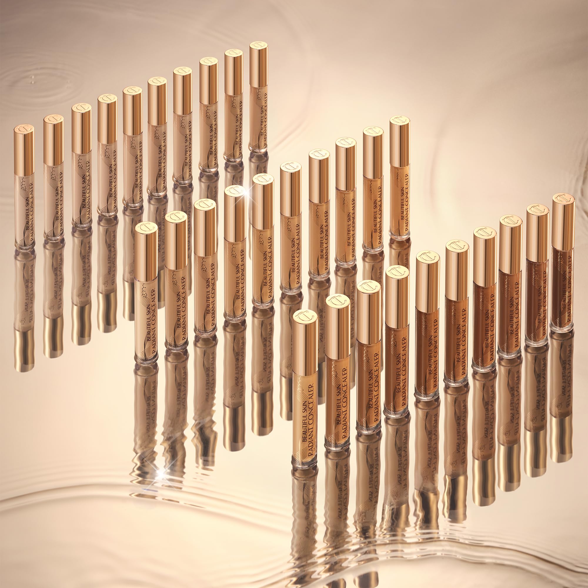 Charlotte Tilbury applying concealer under eye for immediate brightening
