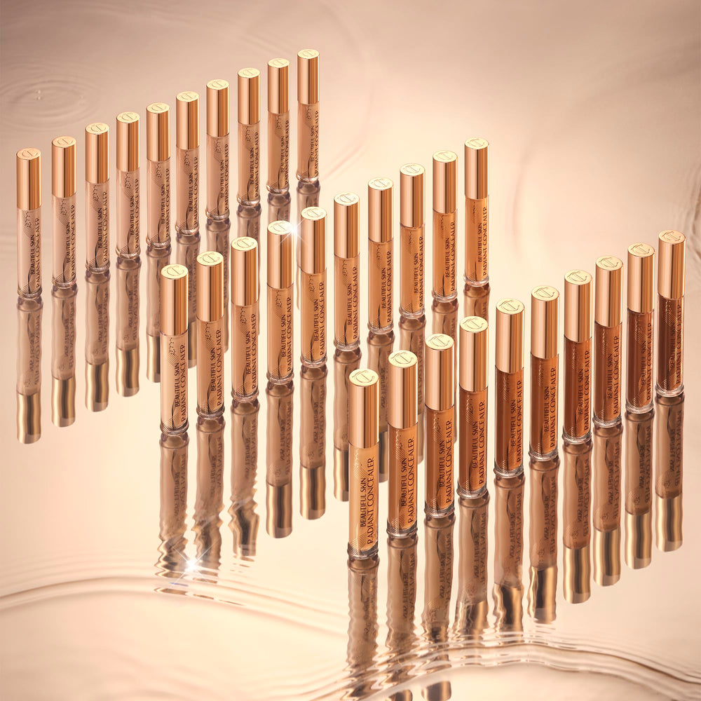 Charlotte Tilbury applying concealer under eye for immediate brightening