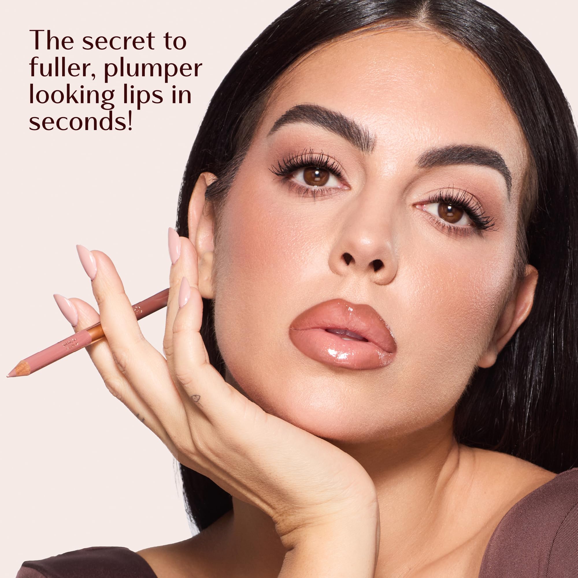 Charlotte Tilbury size comparison next to lipstick showing compact travel-friendly benefit