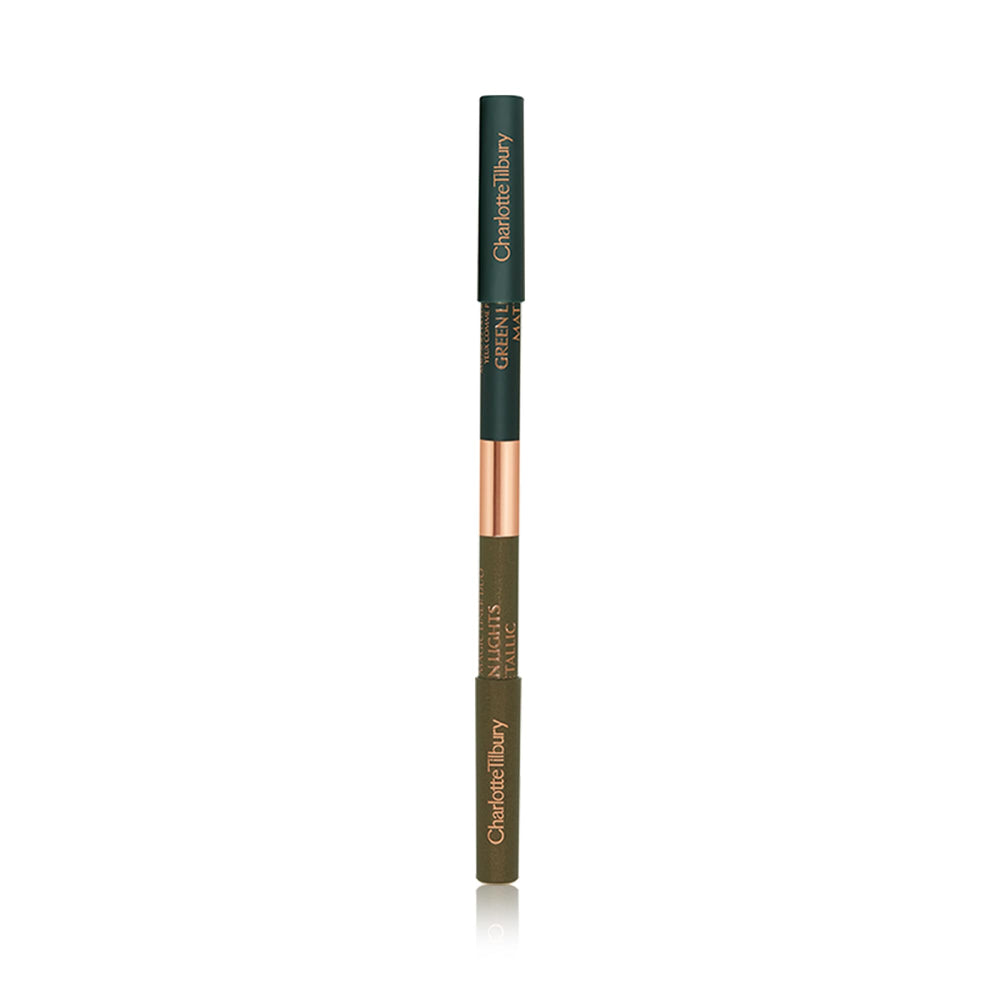 Charlotte Tilbury model applying eyeliner to create defined outer line and inner highlight