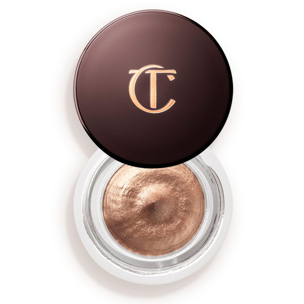 Charlotte Tilbury front jar view showing Oyster Pearl shade and elegant packaging benefit