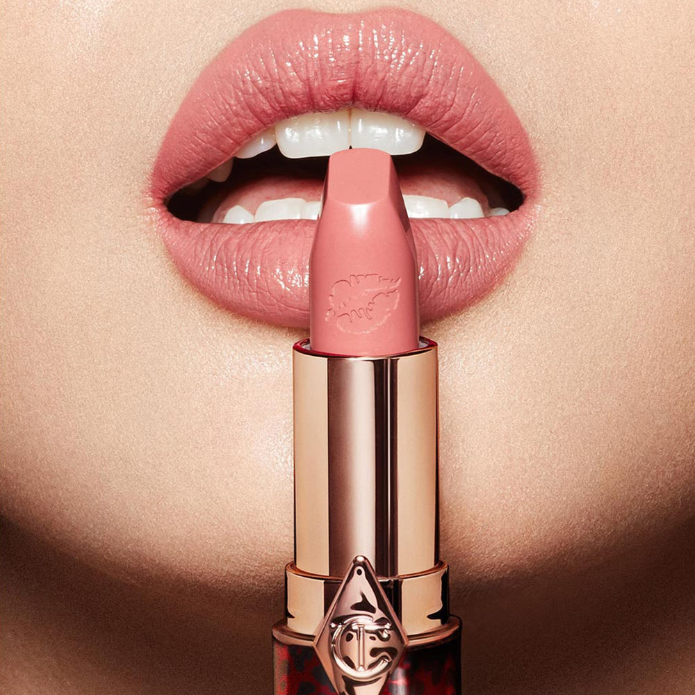Charlotte Tilbury lipstick texture close-up showing creamy satin pigment, highlights hydration