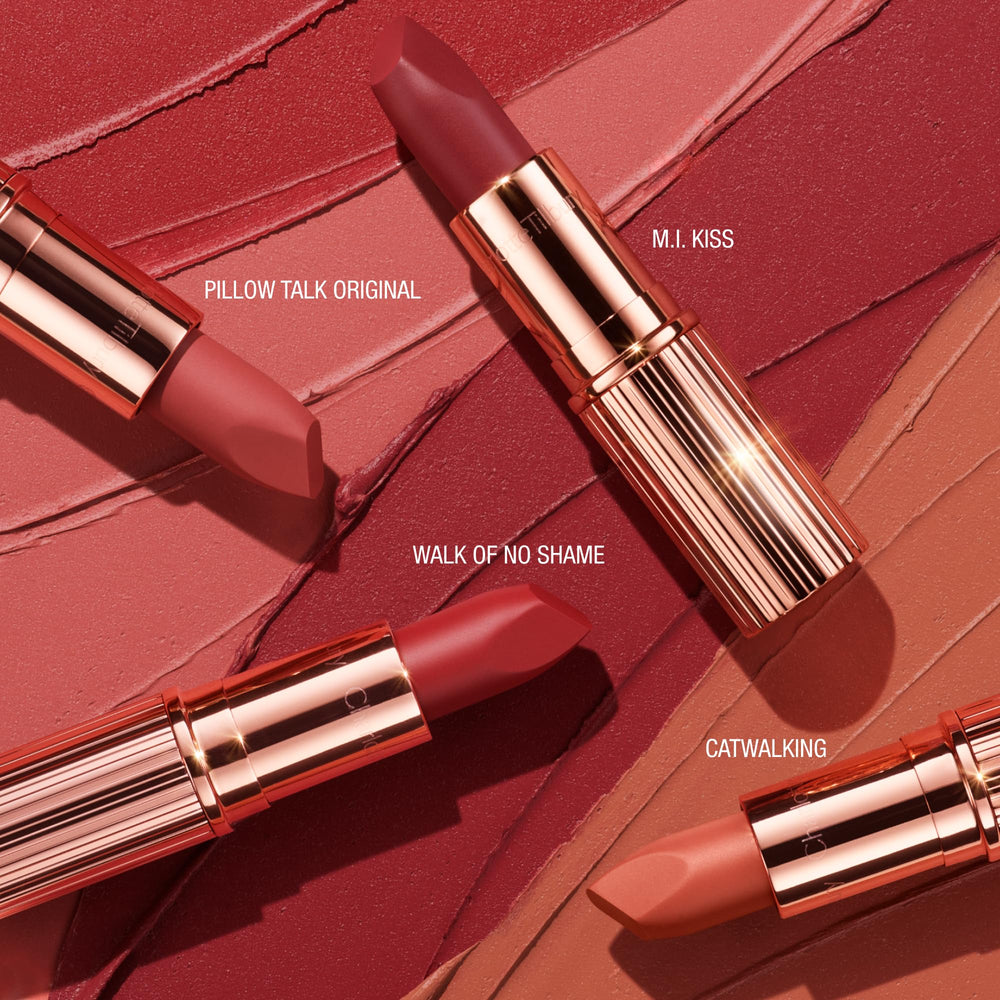 Charlotte Tilbury applying to lips close-up illustrating clean, defined edge