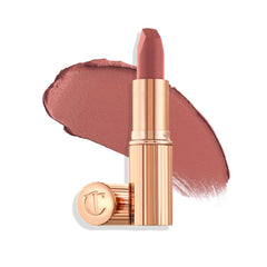 Charlotte Tilbury front packaging showing elegant stick and branding benefits quick identification