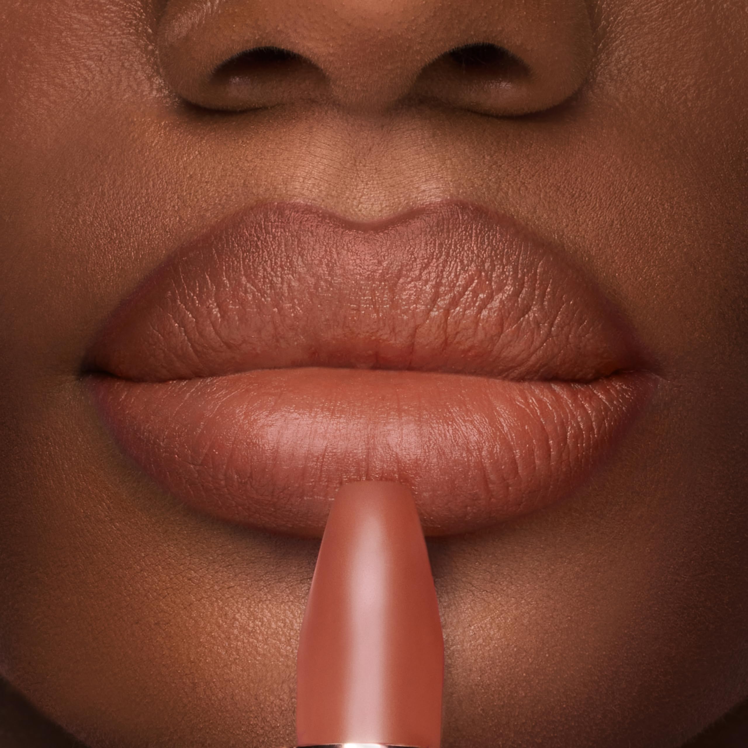 Charlotte Tilbury Matte Revolution applied on lips demonstrating natural matte look