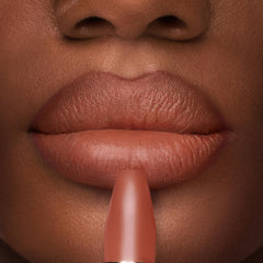 Charlotte Tilbury Matte Revolution applied on lips demonstrating natural matte look