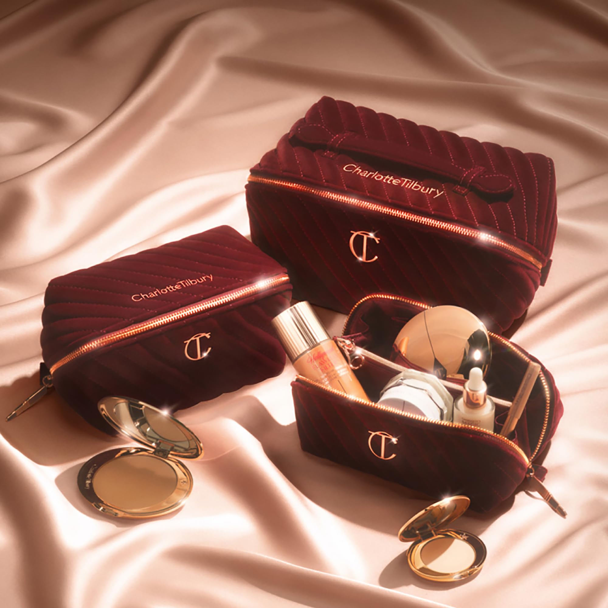Charlotte Tilbury close-up of quilted velvet and zipper detail highlighting protective padding and luxury touch