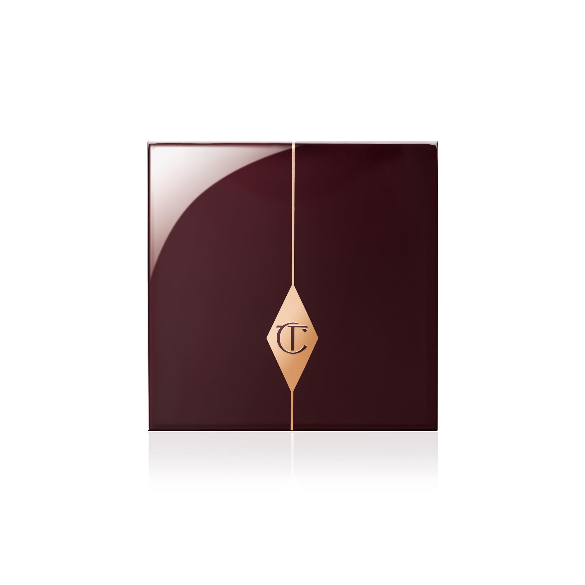 Charlotte Tilbury palette in hand for scale showing compact size and on-the-go convenience