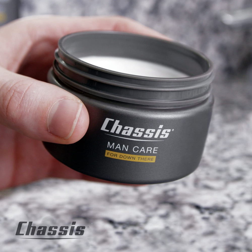 Chassis tube next to a hand showing compact travel-ready size