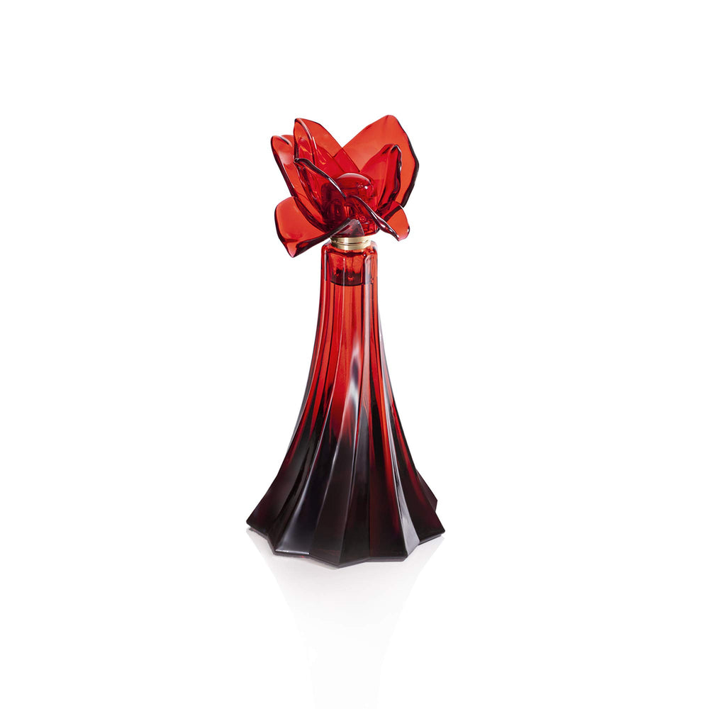 Christian Siriano bottle close-up showing cap and glass detail for premium finish