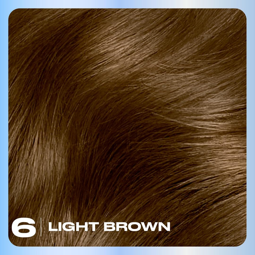 Close-up of creamy colorant texture showing Clairol smooth application benefit