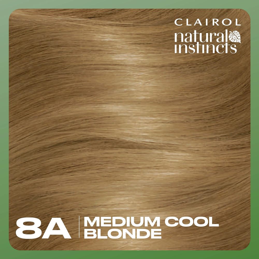 Hand holding Clairol box to show product size and how it fits into a routine
