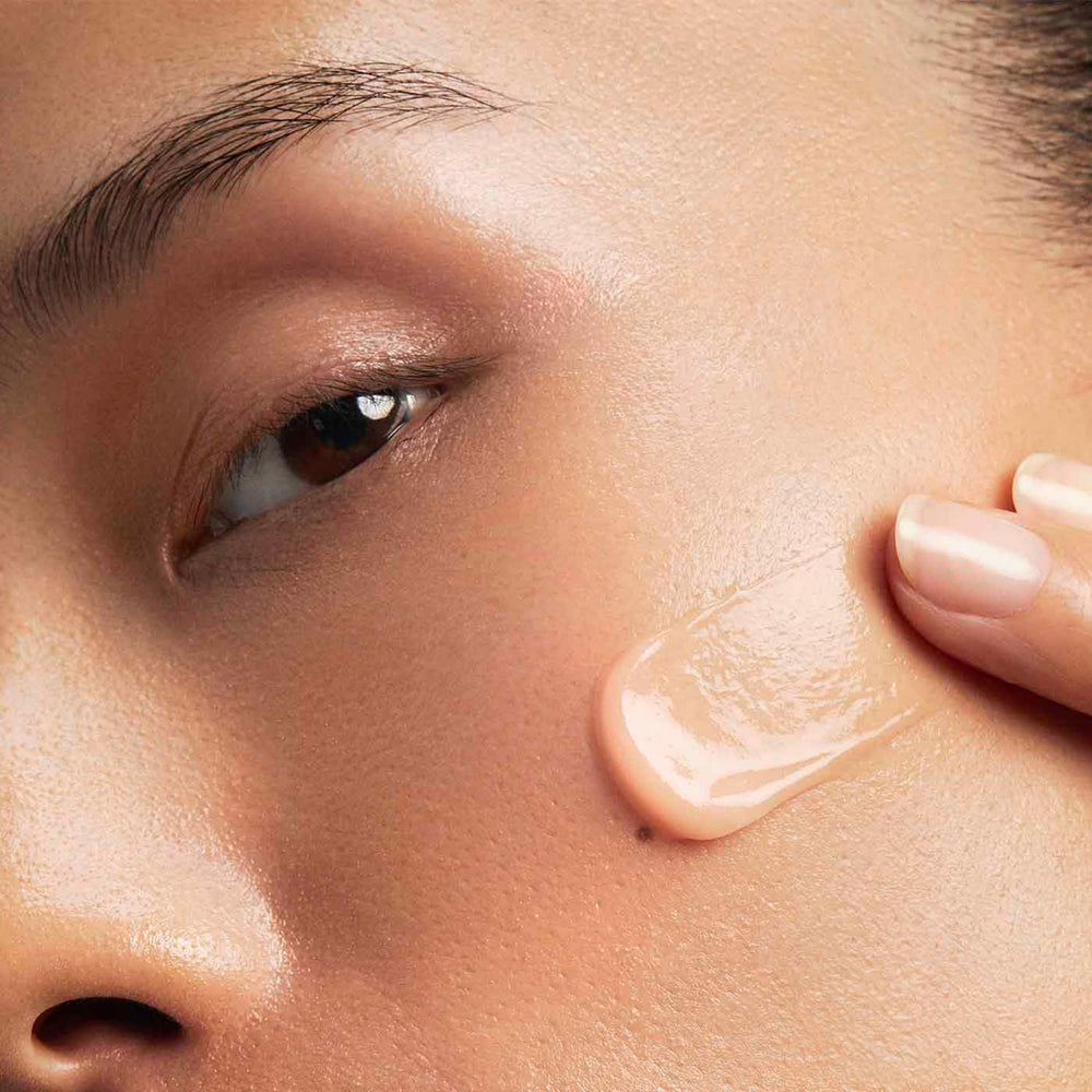Clarins balm spread on hand illustrating ease of application and fast absorption
