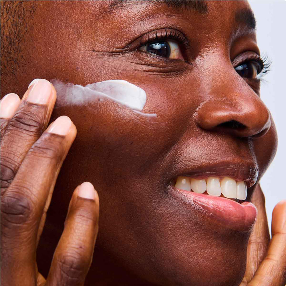 CLARINS applied to neck illustrating lifting motion and targeted firming benefit
