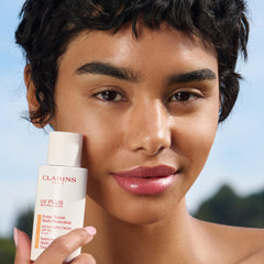 Clarins product label close-up highlighting SPF 50 and anti-pollution benefit