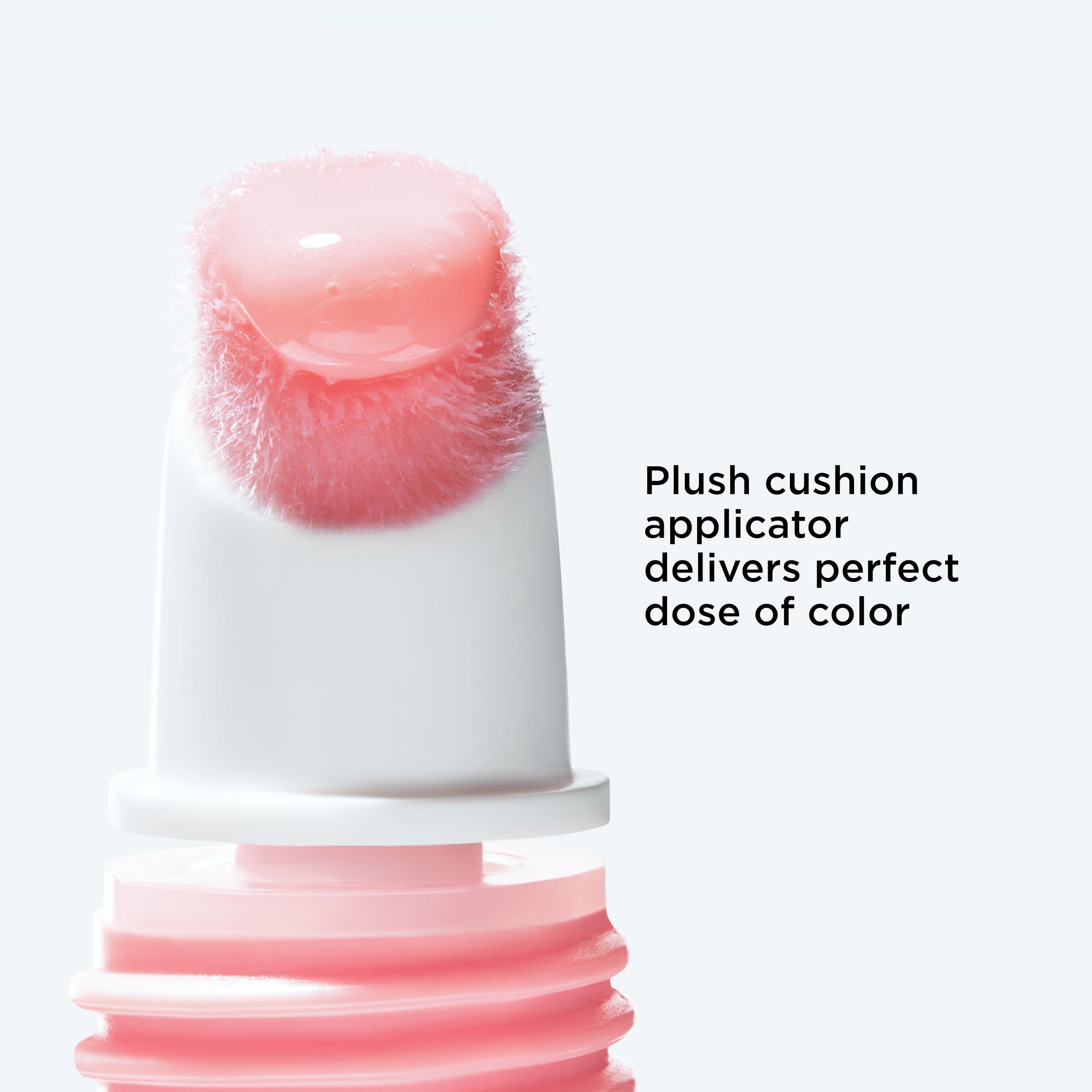Clarins lip perfector size and scale next to a coin for travel-friendly convenience benefit
