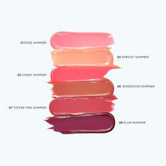 Clarins lip perfector swatches on skin illustrating sheer color and instant shine benefit