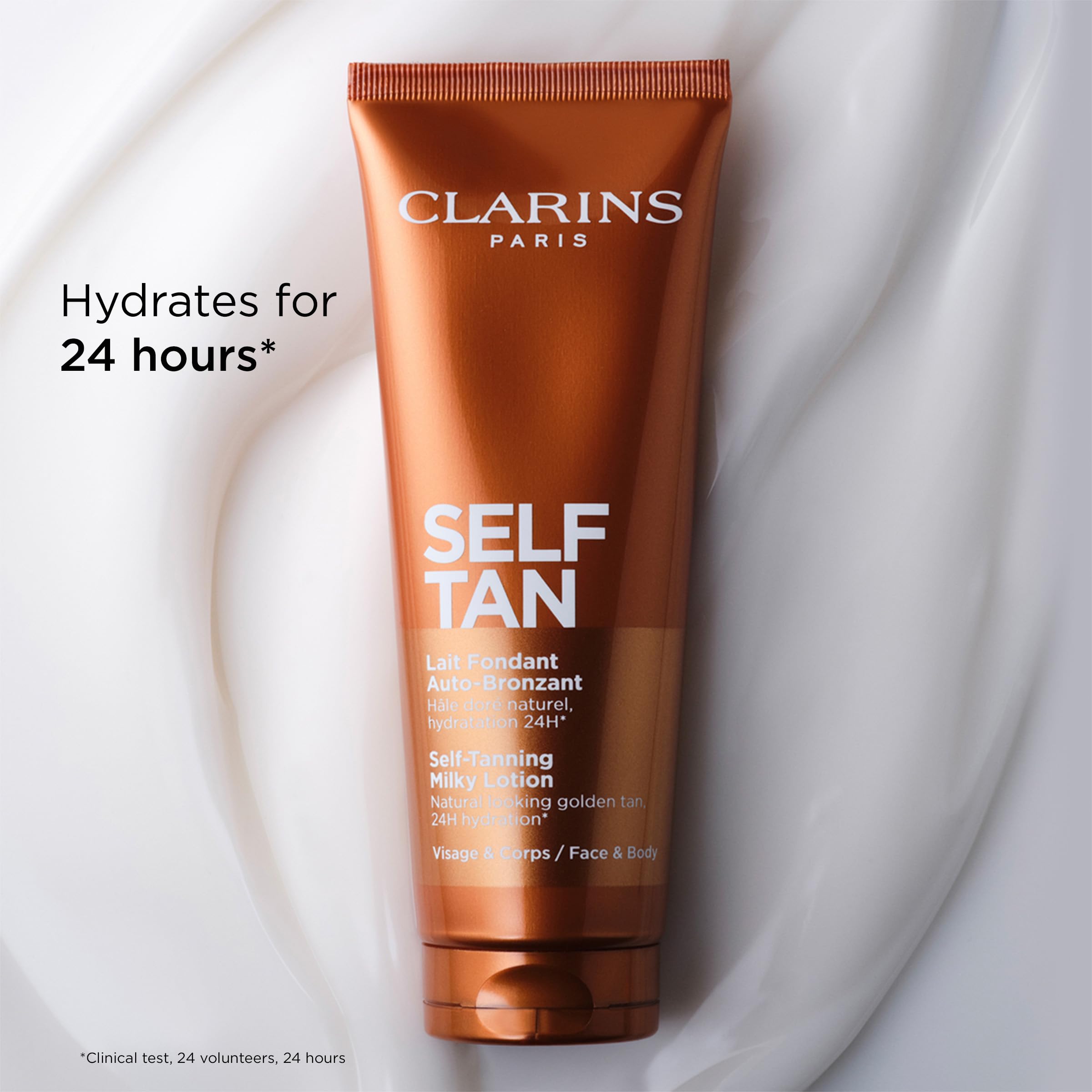 Clarins milky lotion smoothing onto forearm for even body coverage