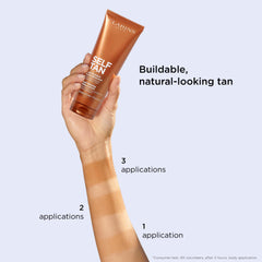 Clarins milky lotion on cheekbone showing natural face tan result
