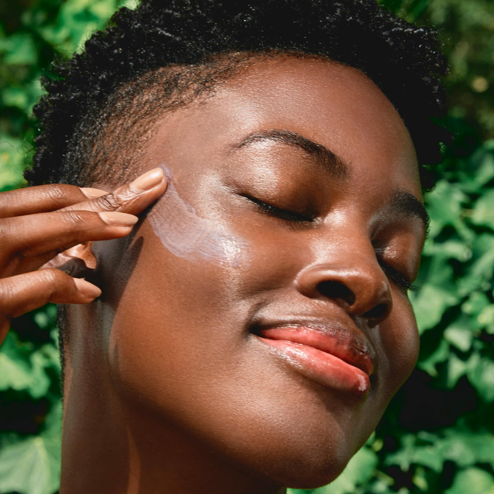 Clarins UV Plus texture close-up demonstrating lightweight, non-greasy finish