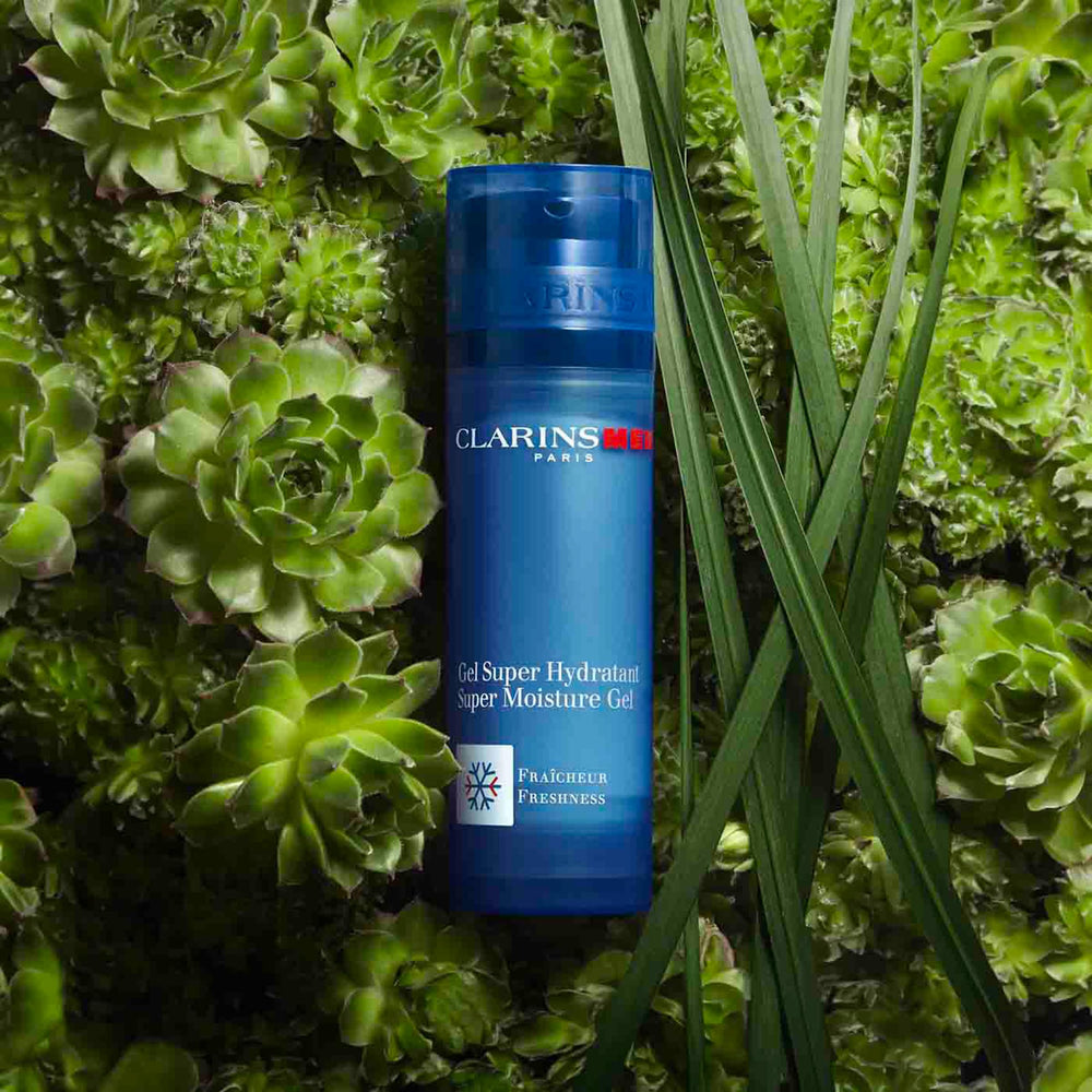 CLARINS label and ingredient list detail highlighting botanical extracts