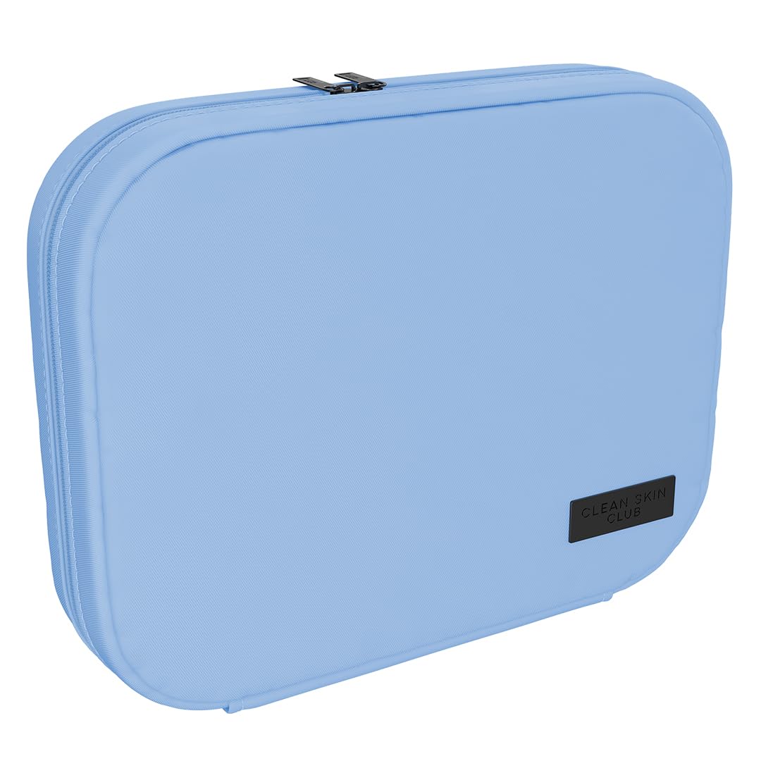 CLEAN SKIN CLUB pouch front view showing compact blue design and easy packing benefit