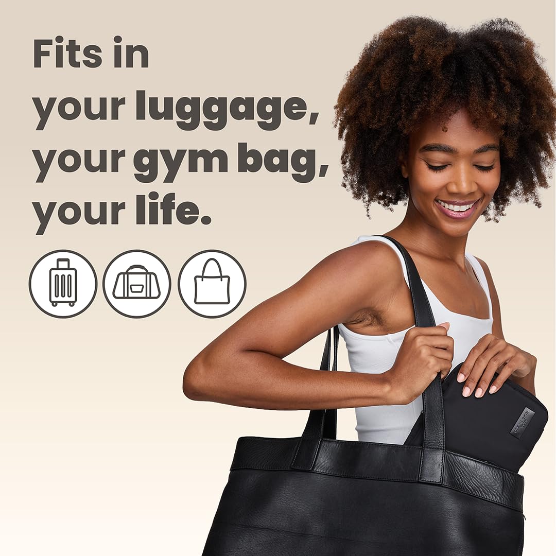 CLEAN SKIN CLUB pouch beside passport showing travel-friendly size