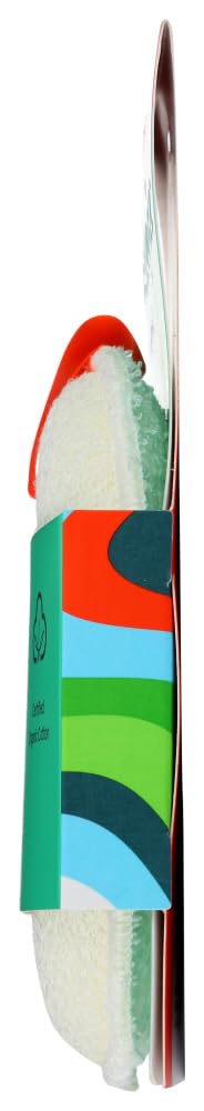 Cleanlogic sponge next to toothbrush showing compact size and travel convenience benefit