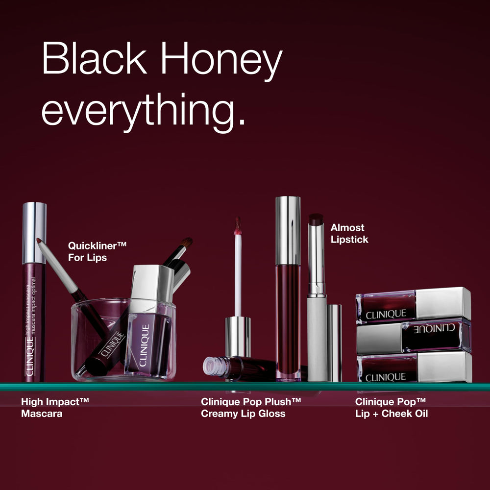 Clinique tube reflection on surface emphasizing glossy formula and quality
