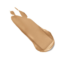 Clinique CC Cream being applied to cheek with finger, Clinique shows easy buildable coverage
