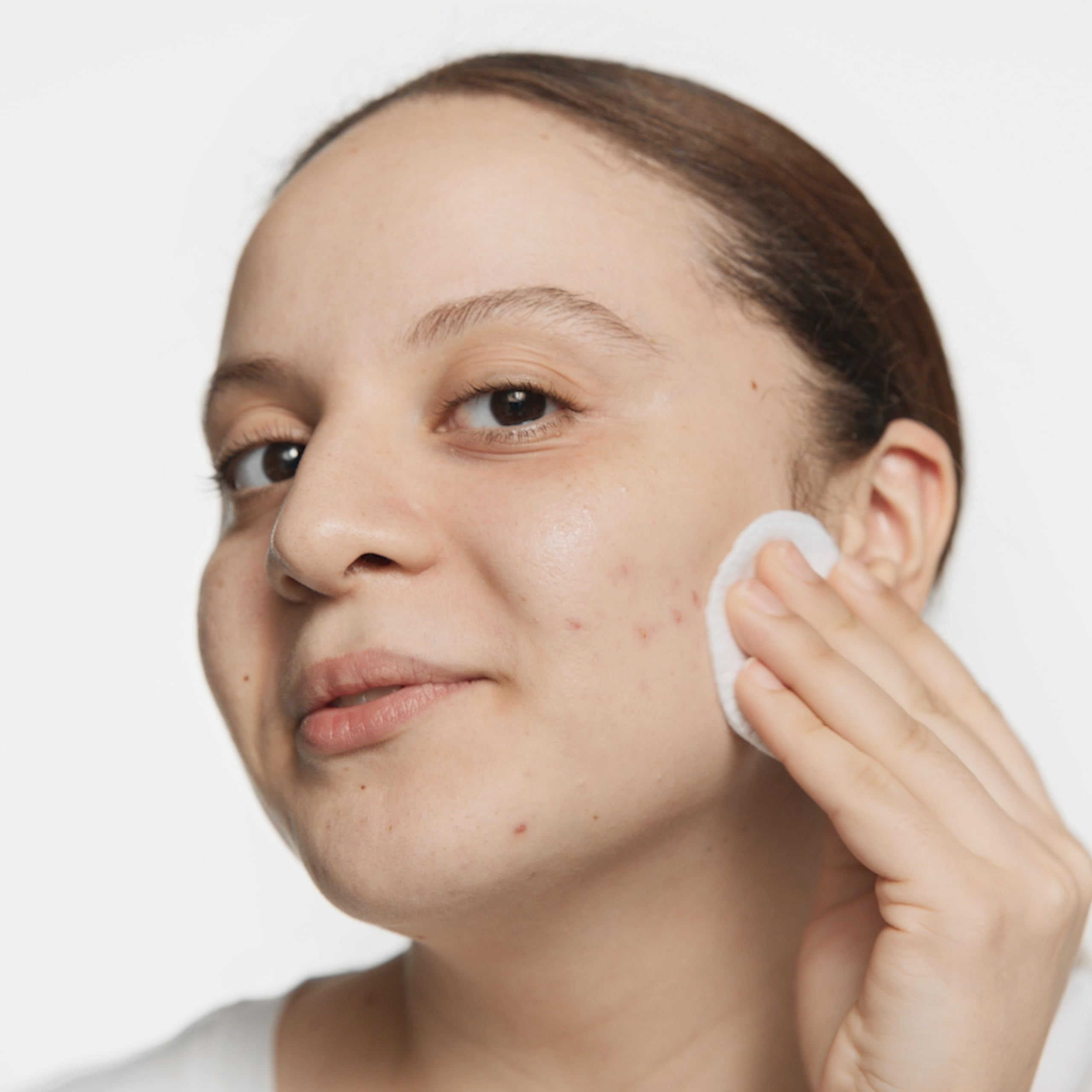 Clinique in-use with cotton pad demonstrating efficient exfoliation benefit