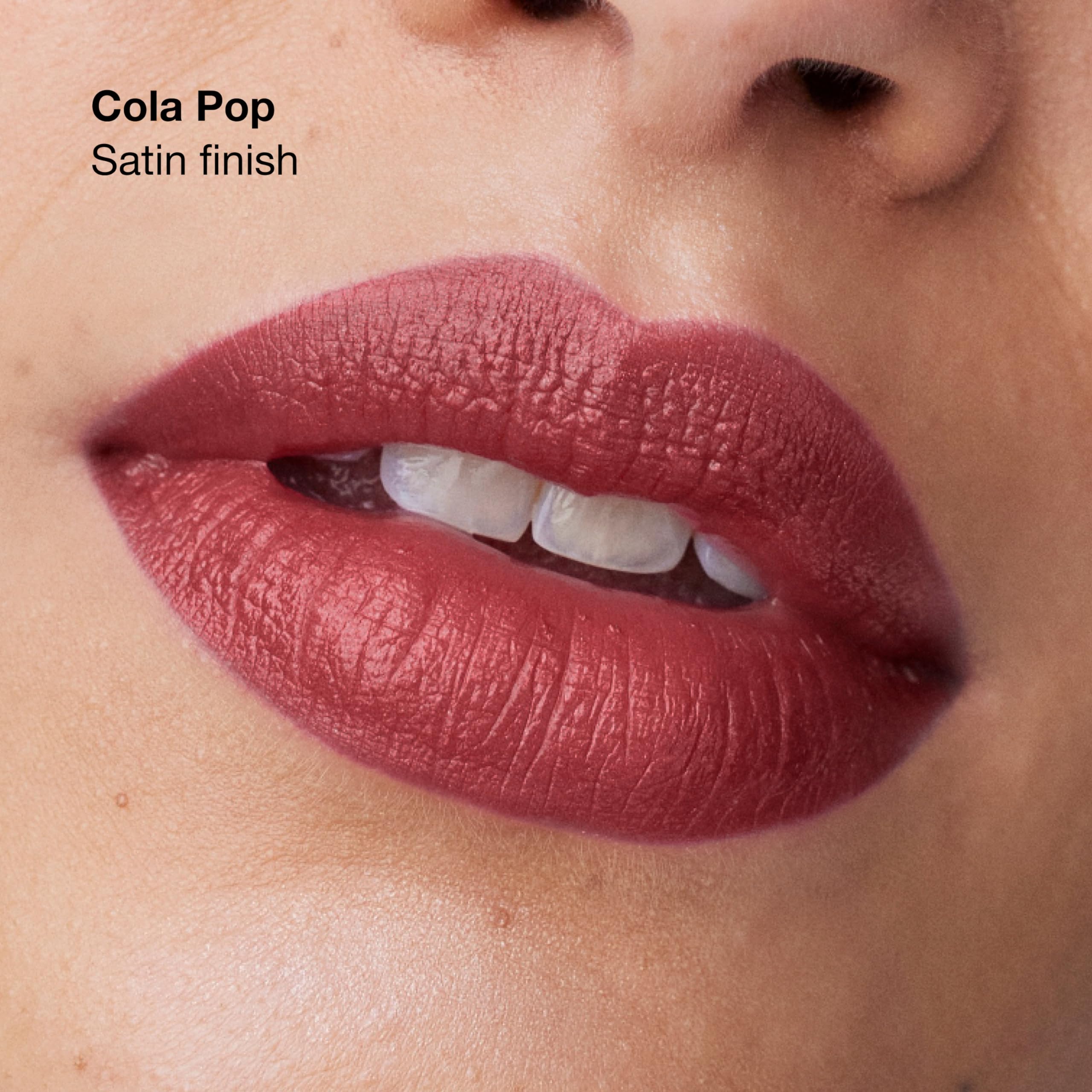 Clinique Pop Longwear on lips close-up showing Cola Pop shade, vibrant confidence boost