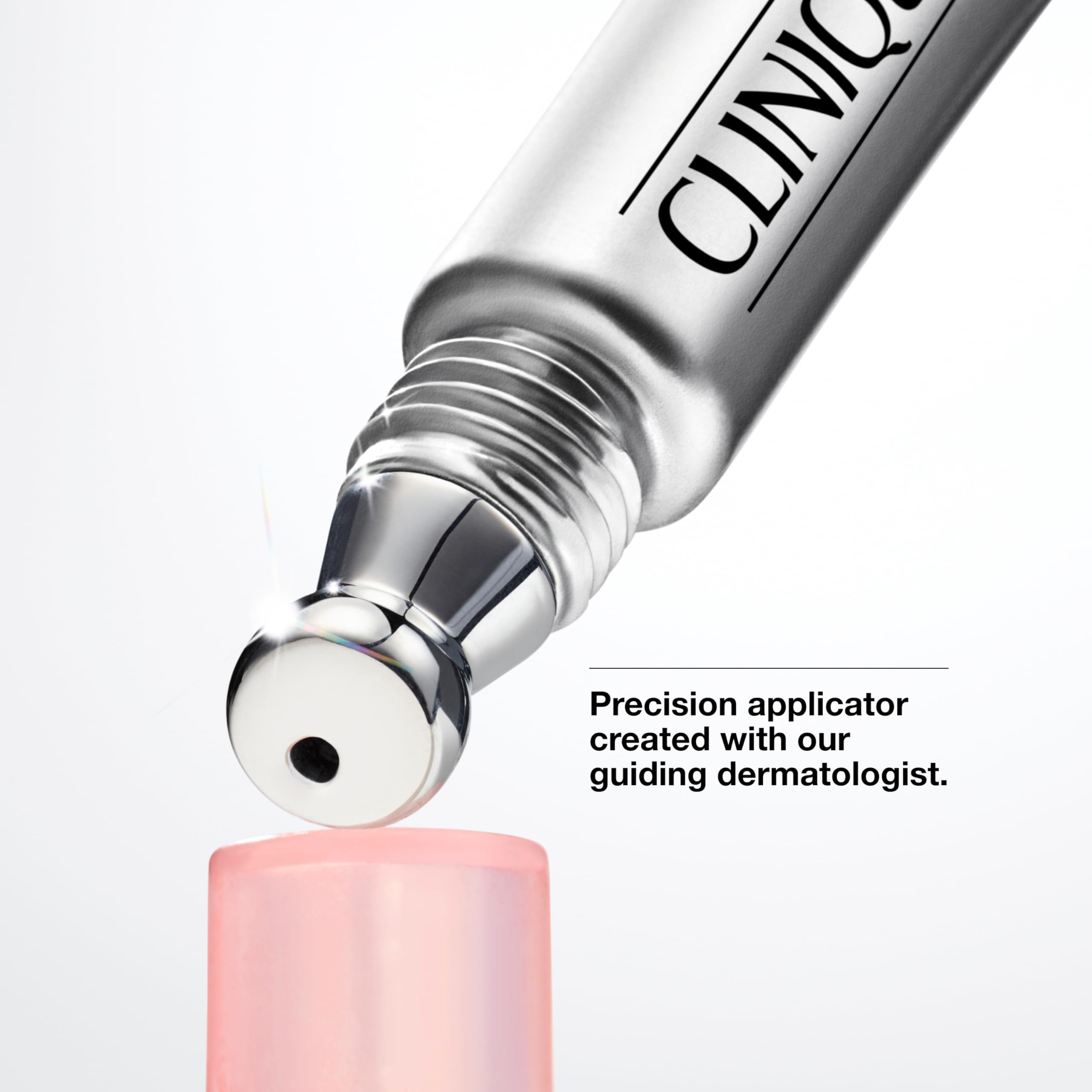Clinique applicator in use under eye, helps reduce puffiness and target dark circles
