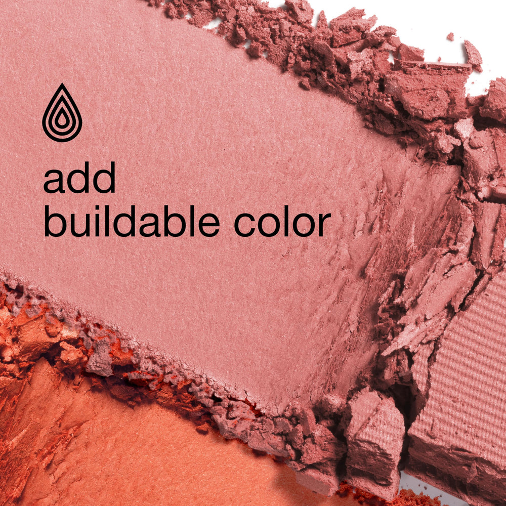Clinique soft-pressed powder blusher brush and swatch on skin demonstrating buildable natural color