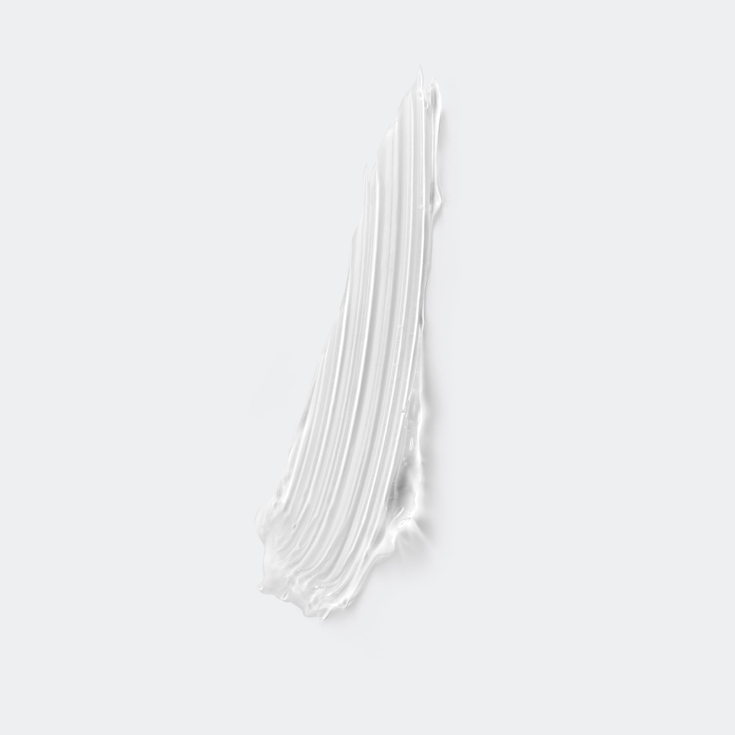 Clinique spoolie close-up displaying brush teeth for precise sculpting and control