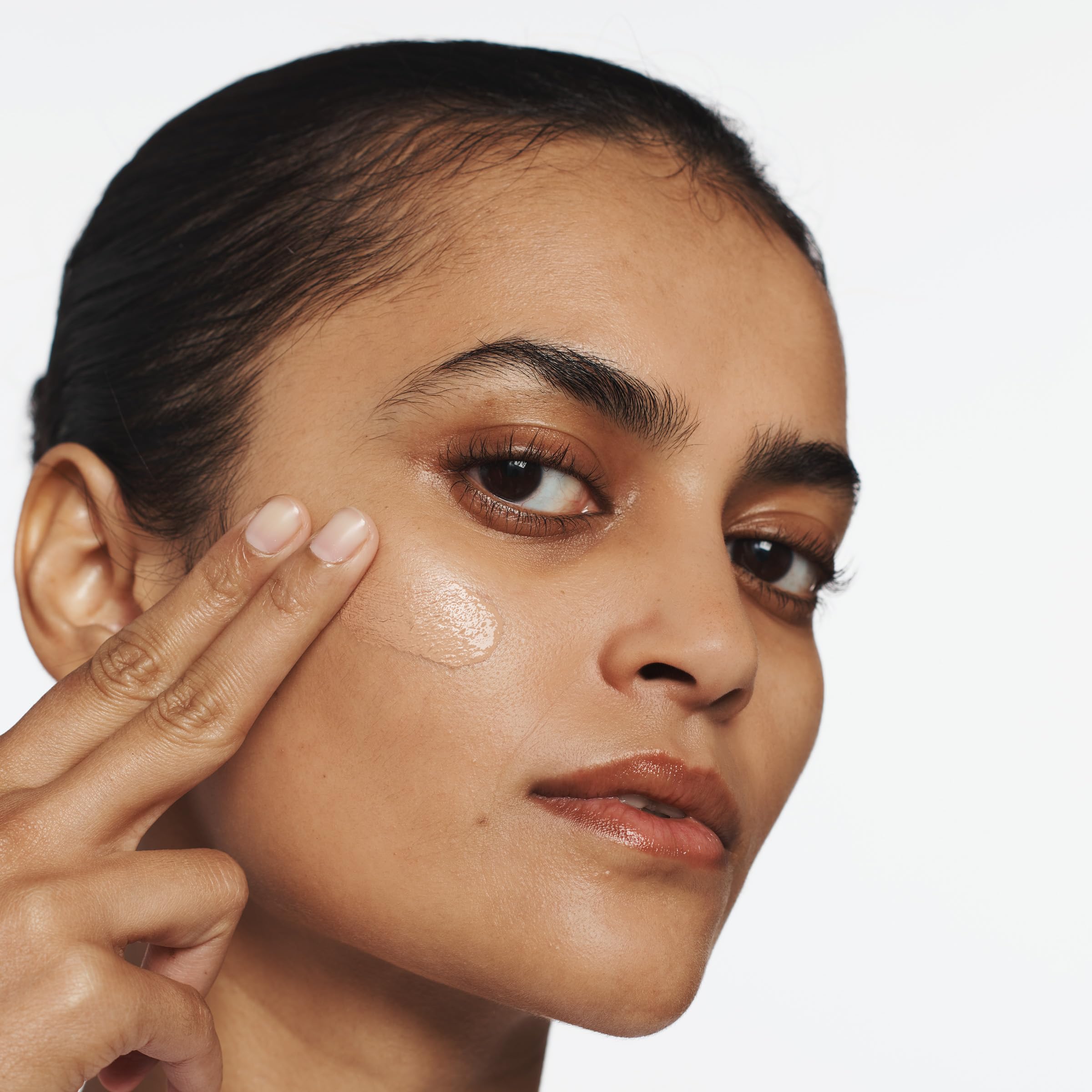 Clinique Superbalanced texture close-up showing smooth blendability benefit