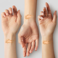 Clinique powder applied in hand for on-the-go touchup that mattifies skin