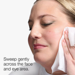 Clinique wipe removing mascara from eye area demonstrating effective makeup removal