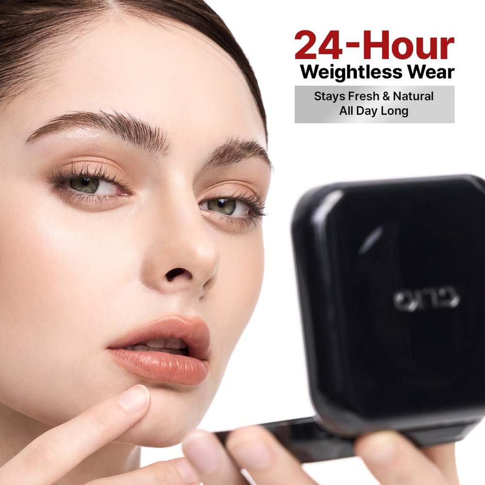 CLIO PROFESSIONAL compact held in hand illustrating portable size and travel convenience