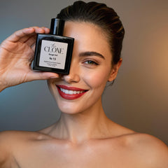Clone Rouge Veil No. 13 held in hand to show true 50ml size and portability